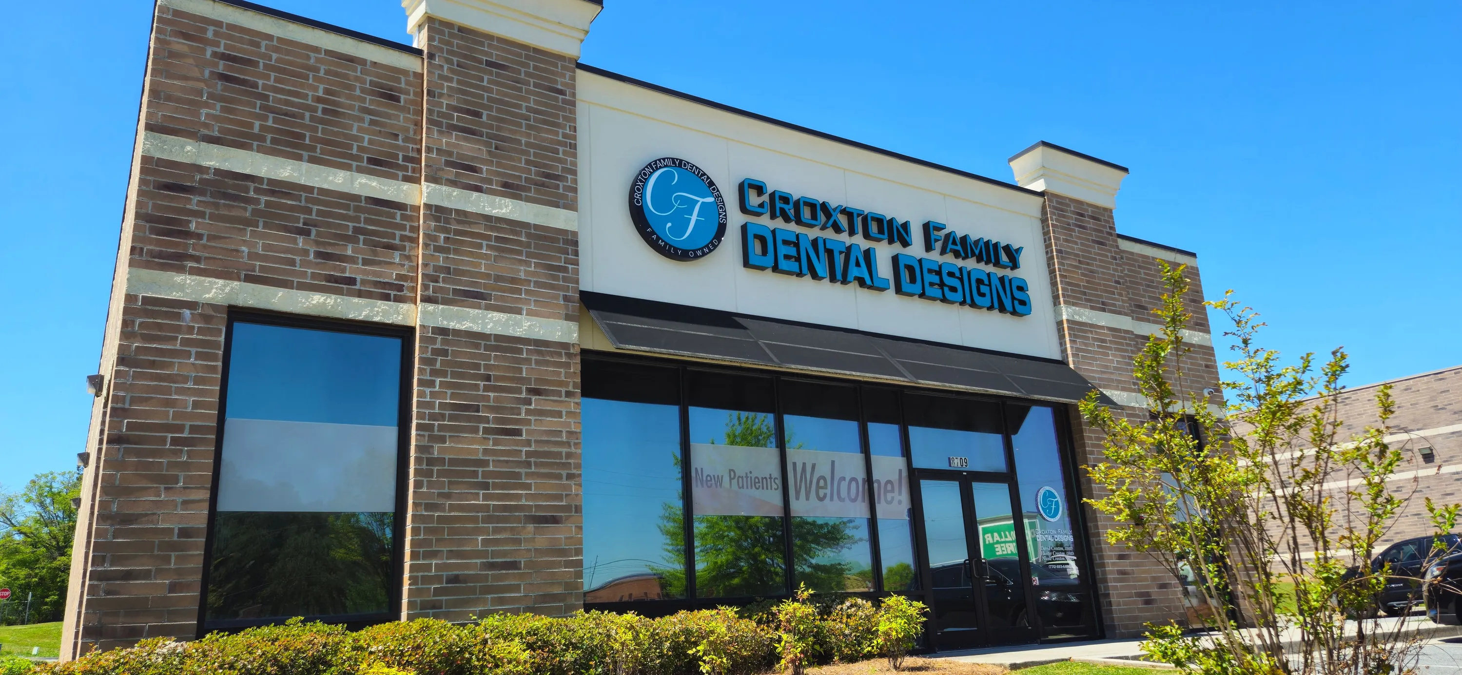 The Croxton Family Dental Designs team in their Dallas, GA office